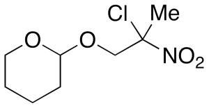 2-(2-Chloro-2-nitropropoxy)tetrahydro-2H-pyran
