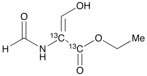 2-(Formylamino)-3-hydroxy-2-propenoic-13C2 Acid Ethyl Ester